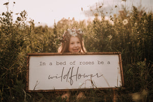 In A Bed Of Roses Be A Wildflower